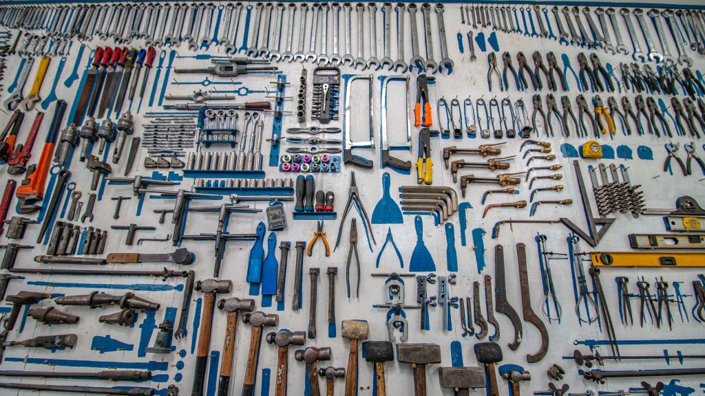 A wall covered in tools. 