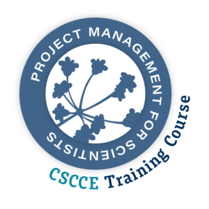 The digital badge image for Project Management for Scientists (PMB) is a blue circle with a white center. PROJECT MANAGEMENT FOR SCIENTISTS is spelled out in white, over the top of the blue circle, and a blue umbel design is overlaid in the white center. At the bottom right, on the outside of the circle, it says “CSCCE Training Course” in two shades of teal.